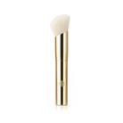 A gold makeup brush with a rounded triangular white bristle head, shown vertically on a clean white background.