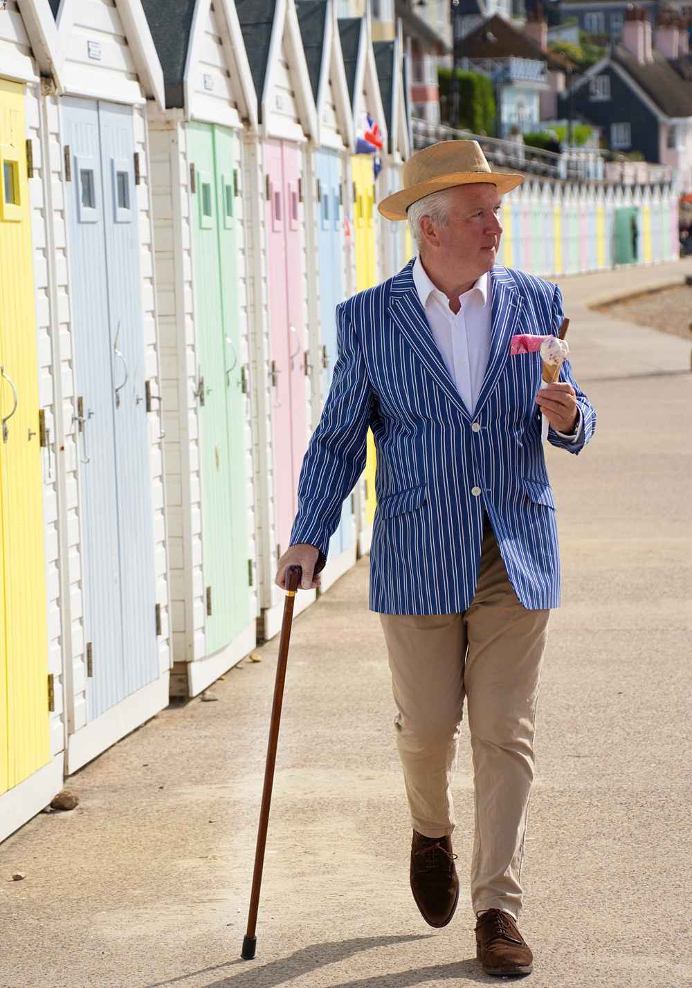 Man walking with walking stick cane