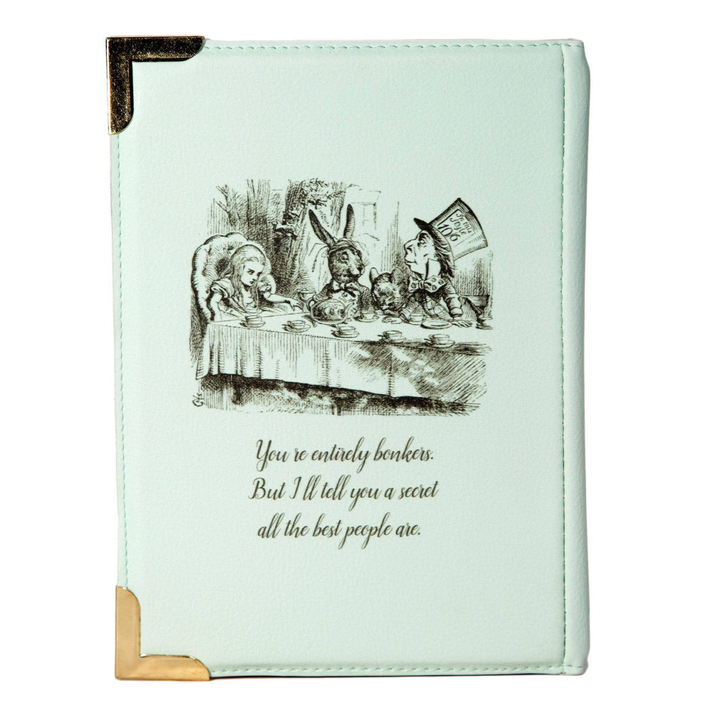 Mint green notebook with Alice in Wonderland illustration and quote on a white background