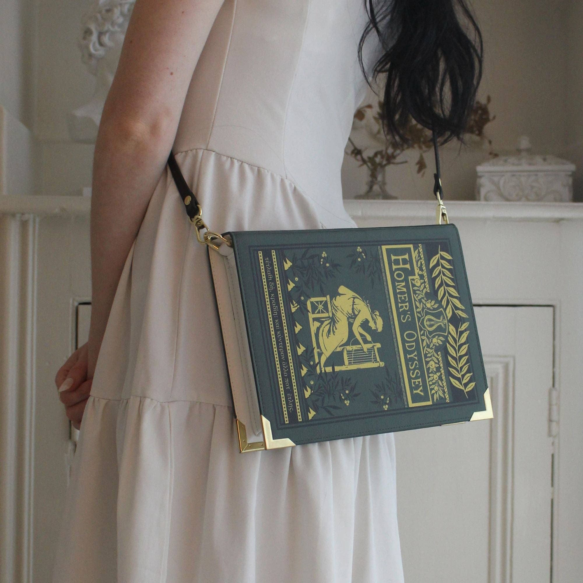 Book-shaped bag with 'Homer's Odyssey' design on a white background