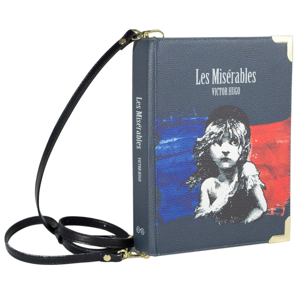 Book-shaped handbag with 'Les Misérables' design on a white background