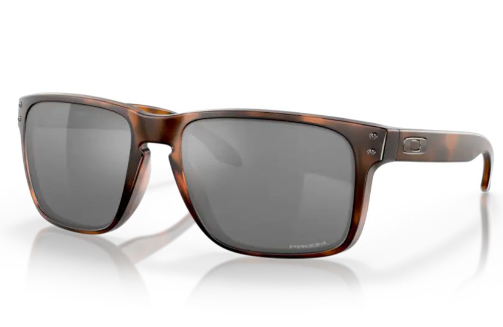 Sunglasses with tortoiseshell frame and dark lenses on a white background