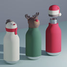 Three decorative water bottles with Christmas-themed designs on a gray background