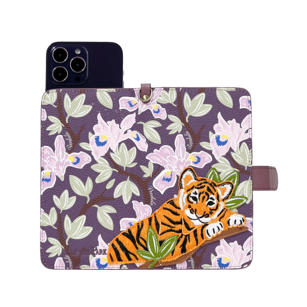 Phone case with a tiger design on a floral background