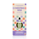 Tisserand Apothecary 'Christmas Wish' diffuser oil in its original packaging, featuring a cream-colored box with a pastel checkerboard pattern and a green glass dropper bottle visible through a cutout.