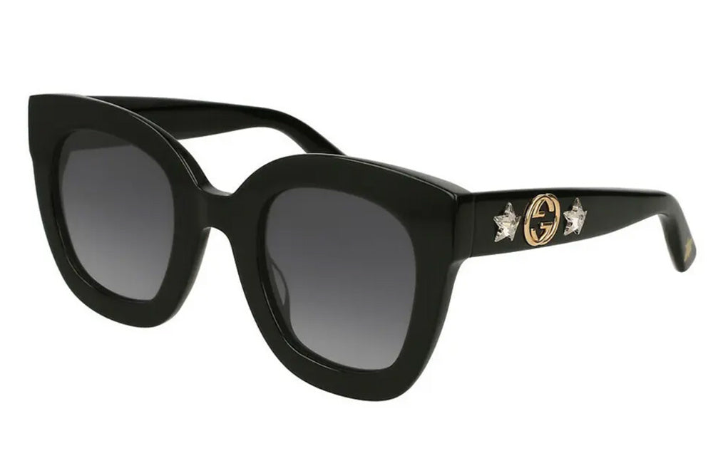 Gucci black sunglasses with stars on temple