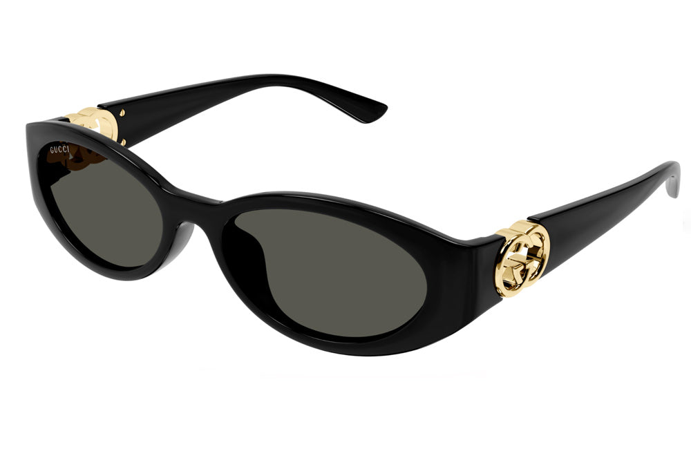 Slim narrow black and gold gucci sunglasses