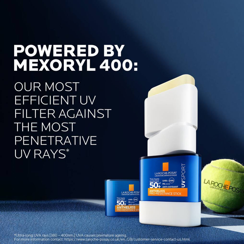 La Roche-Posay sunscreen stick with packaging and tennis ball on a blue background, featuring Mexoryl 400 technology.