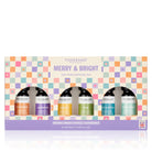 Tisserand Merry & Bright 6-piece essential oil gift set in a pastel checkered box
