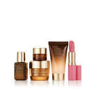 Estée Lauder cosmetic products on a white background