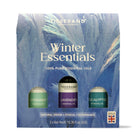 Tisserand Winter Essentials essential oils set packaging with three bottles on a blue background