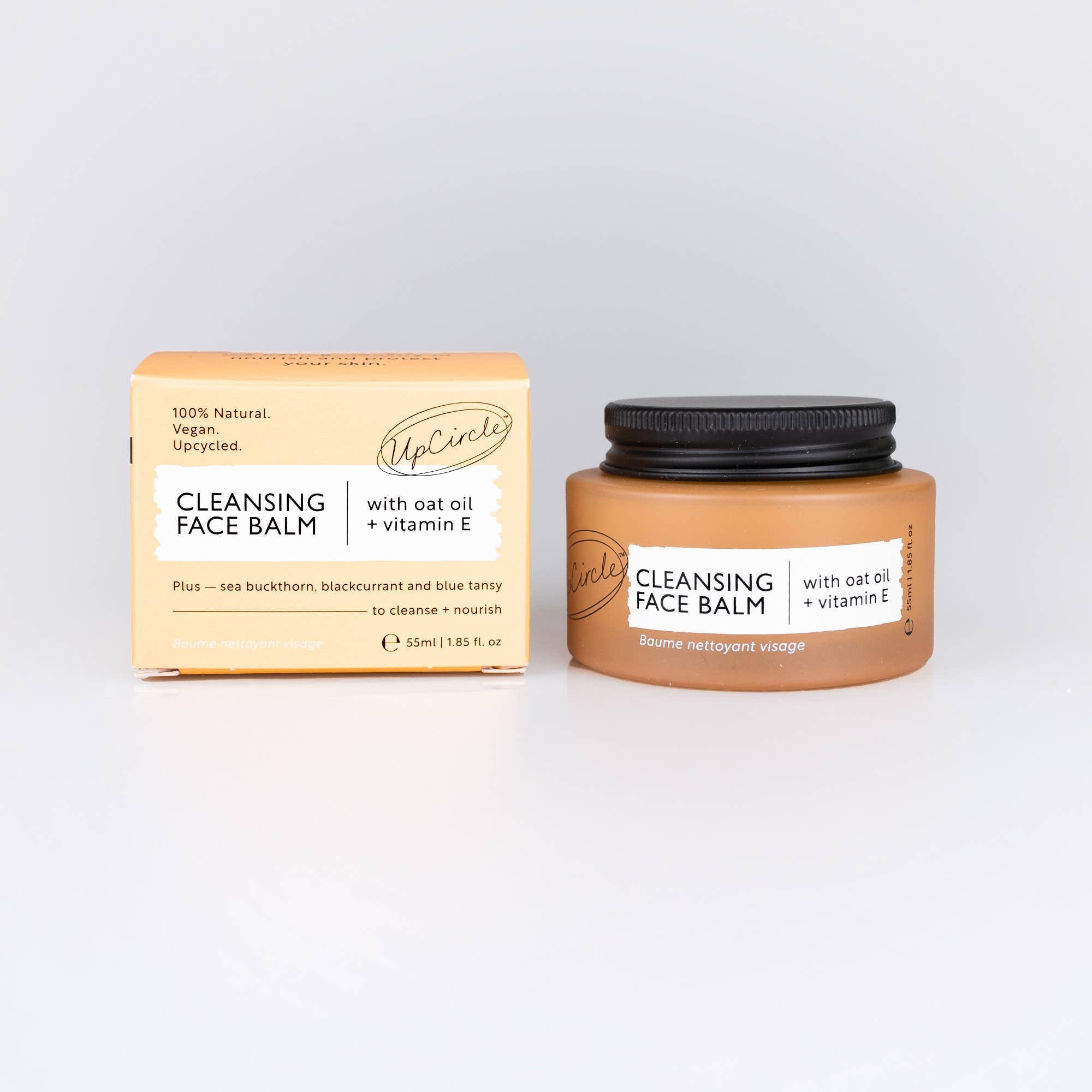 UpCircle cleansing face balm jar and box on a light gray background
