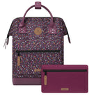 Backpack with multicolored pattern and matching pouch on a white background