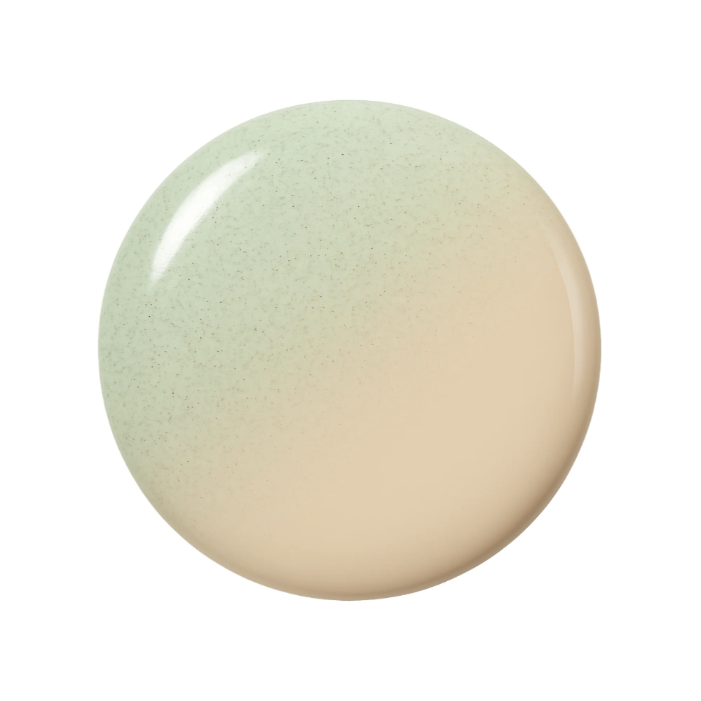 A smooth, glossy circular color swatch showing a soft gradient from pale sage green at the top to warm cream at the bottom, on a solid white background.