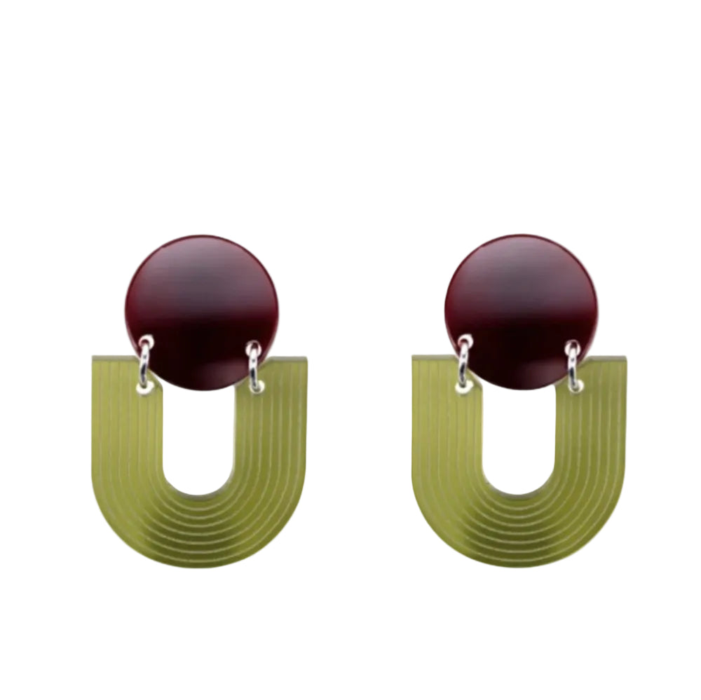 Pair of earrings with dark red circular tops and green U-shaped bases on a white background