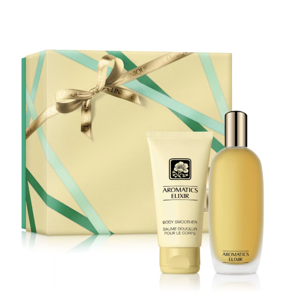 A skincare gift set from Clinique Aromatics Elixir featuring a large cream-colored gift box with mint green ribbon accents and a gold bow, alongside a matching body smoother tube and a large perfume bottle, all on a white background.