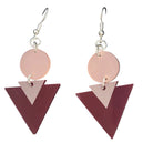 Geometric earrings on a card with a white background