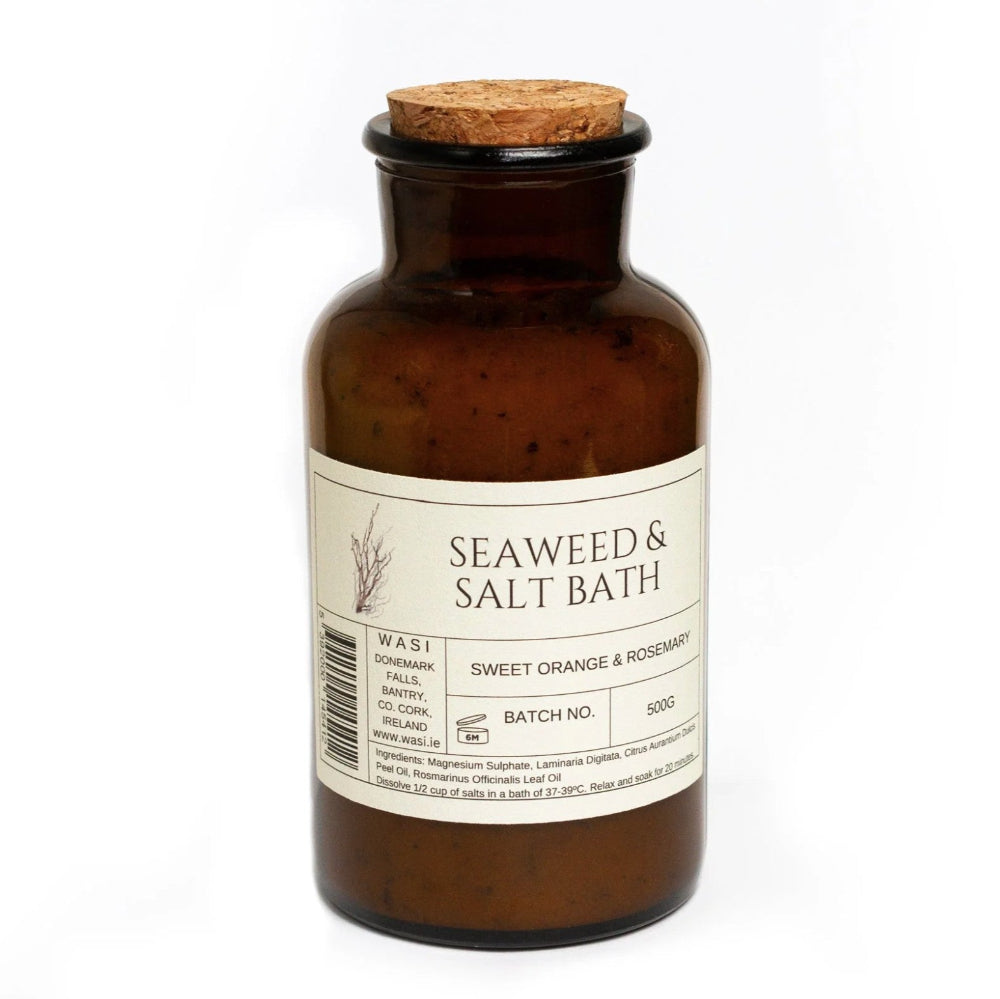Brown bottle labeled 'Seaweed & Salt Bath' with a cork lid on a white background
