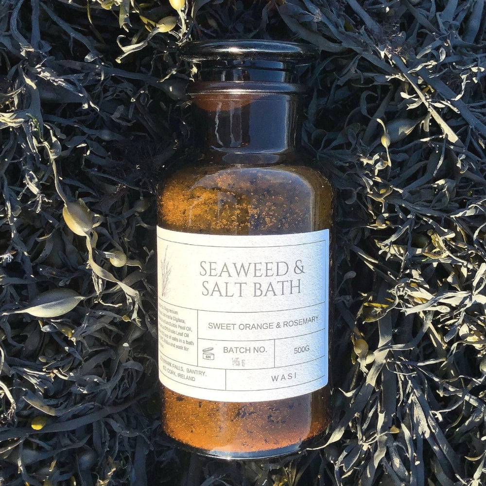 Bottle of Seaweed & Salt Bath on a bed of seaweed