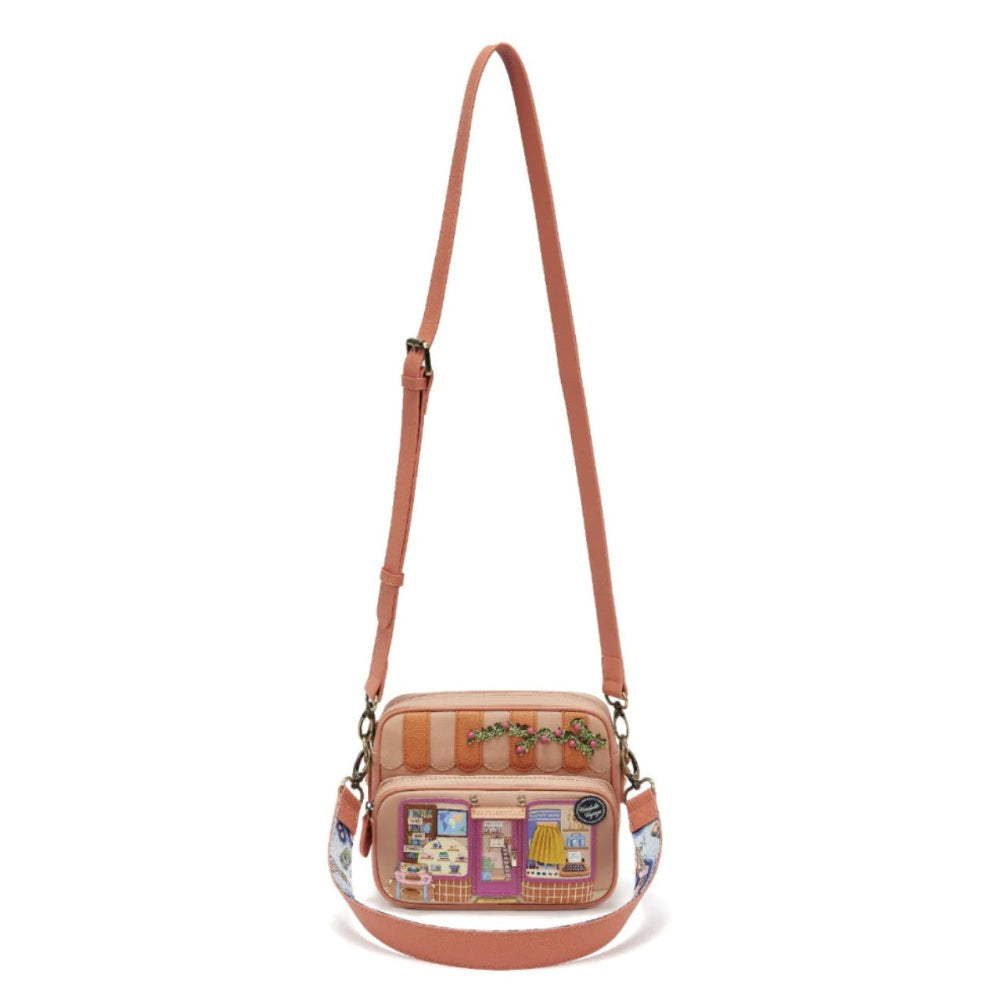 Crossbody bag with a colorful design on a white background