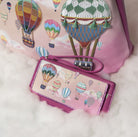 Pink wallet with hot air balloon design on a pink background