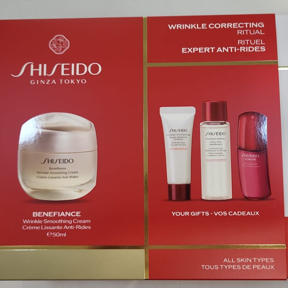 Shiseido skincare set with red and white packaging on a white background