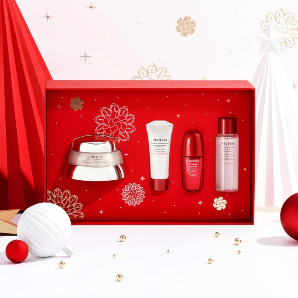 Shiseido skincare product set in a decorative red box with festive elements.
