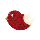 Red bird-shaped brooch pin with a white belly on a white background