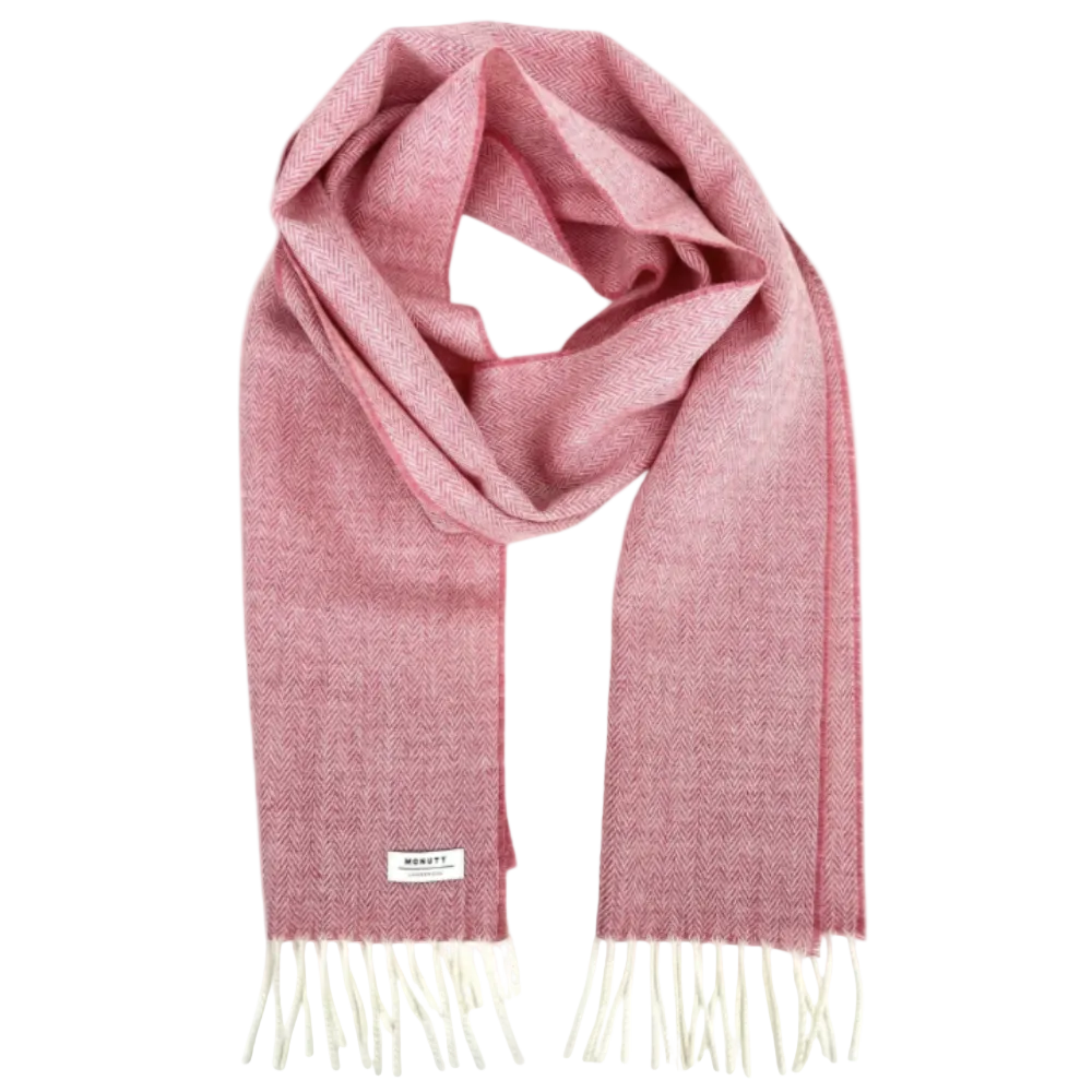 A dusty pink woven scarf with cream fringe ends and a small white brand label, displayed on a clean white background.