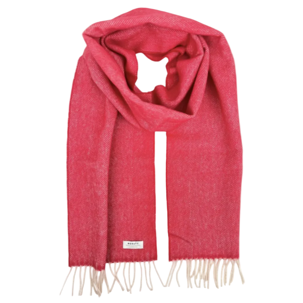 A vibrant red woven scarf with a fine herringbone texture and cream-colored fringe, featuring a small white brand label near the bottom edge.