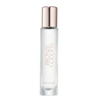 Estée Lauder Bronze Goddess perfume bottle with a metallic rose gold cap and rose gold lettering on a clear glass bottle, set against a plain white background.
