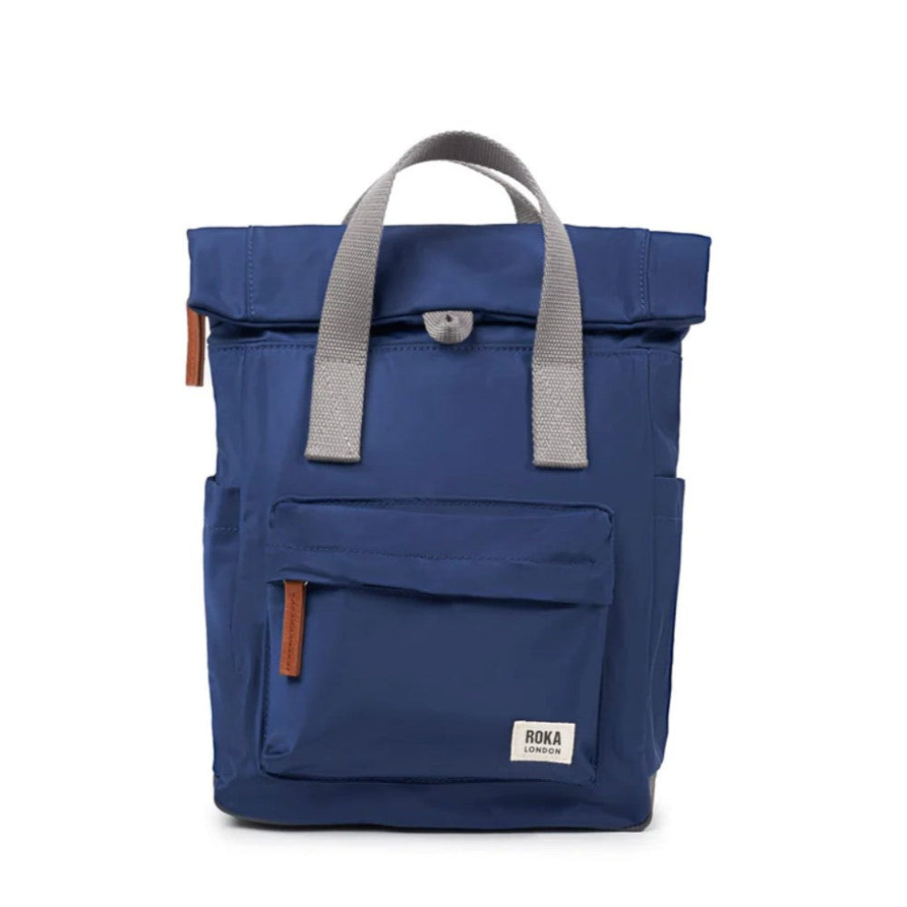 Blue backpack with gray straps on a white background