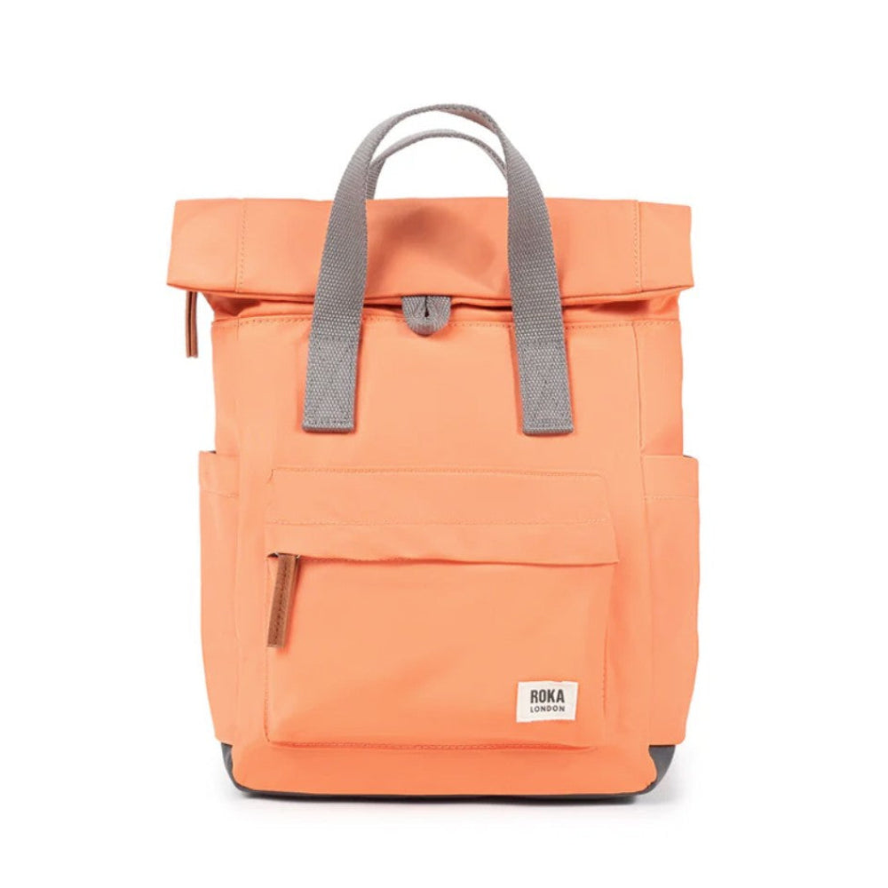 Orange backpack with gray straps on a white background