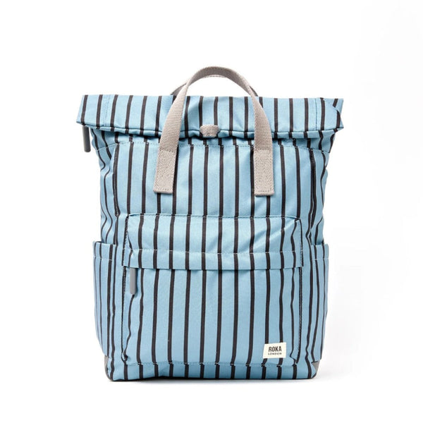 A light blue and black striped roll-top backpack with gray handles, shown against a plain white background.