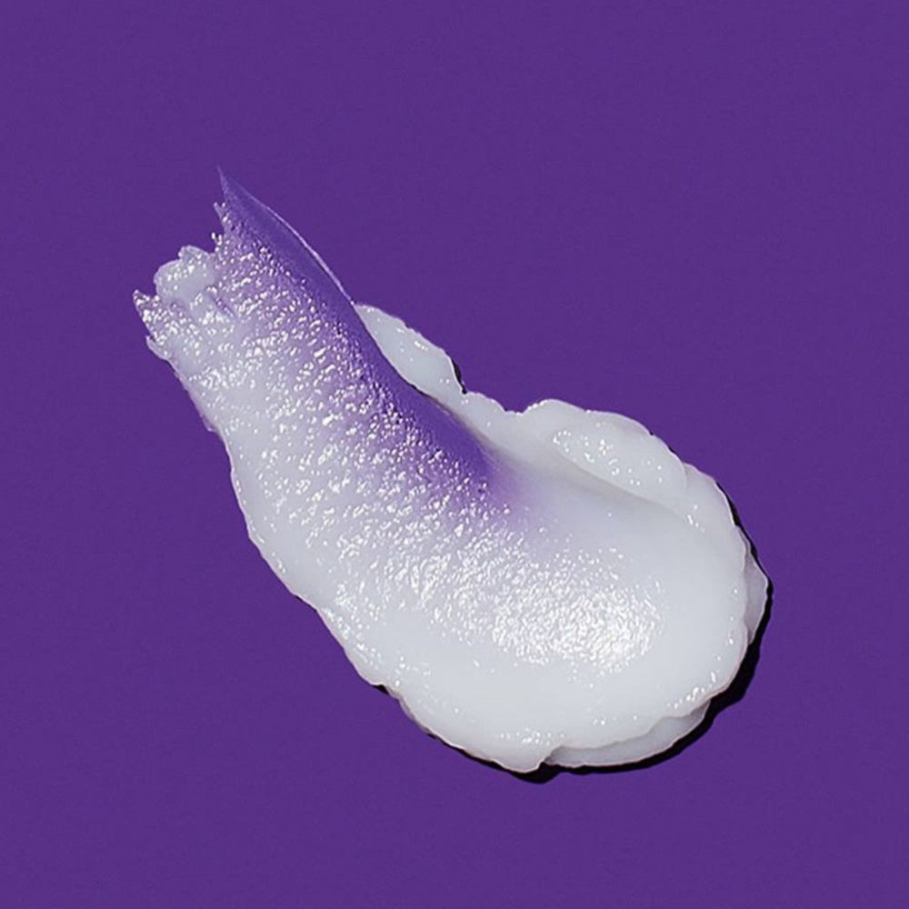 White foam-like substance on a purple background