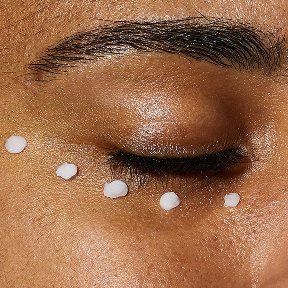 Close-up of a person's eye with salt crystals on the skin