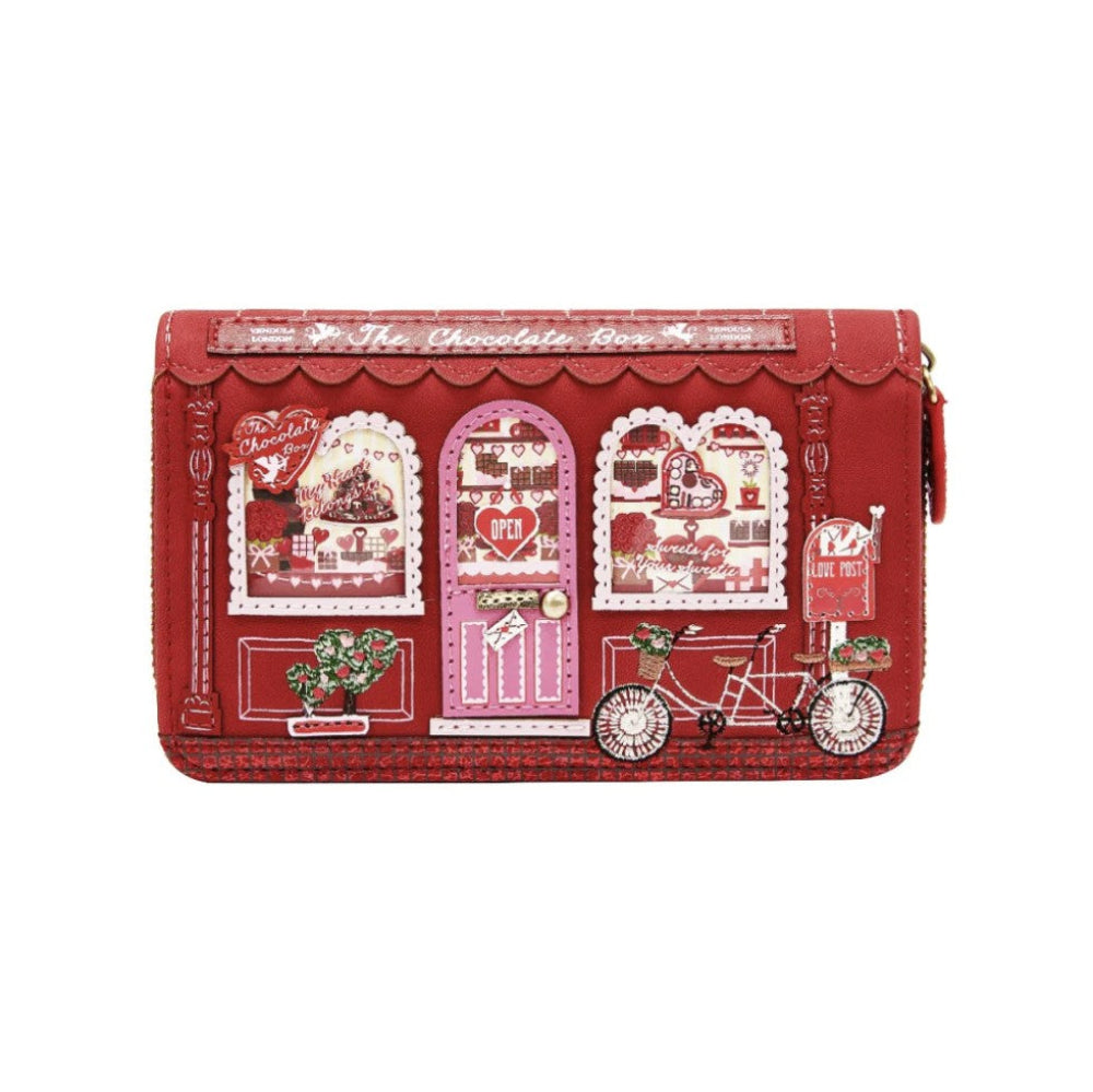 Red wallet with decorative patterns on a white background