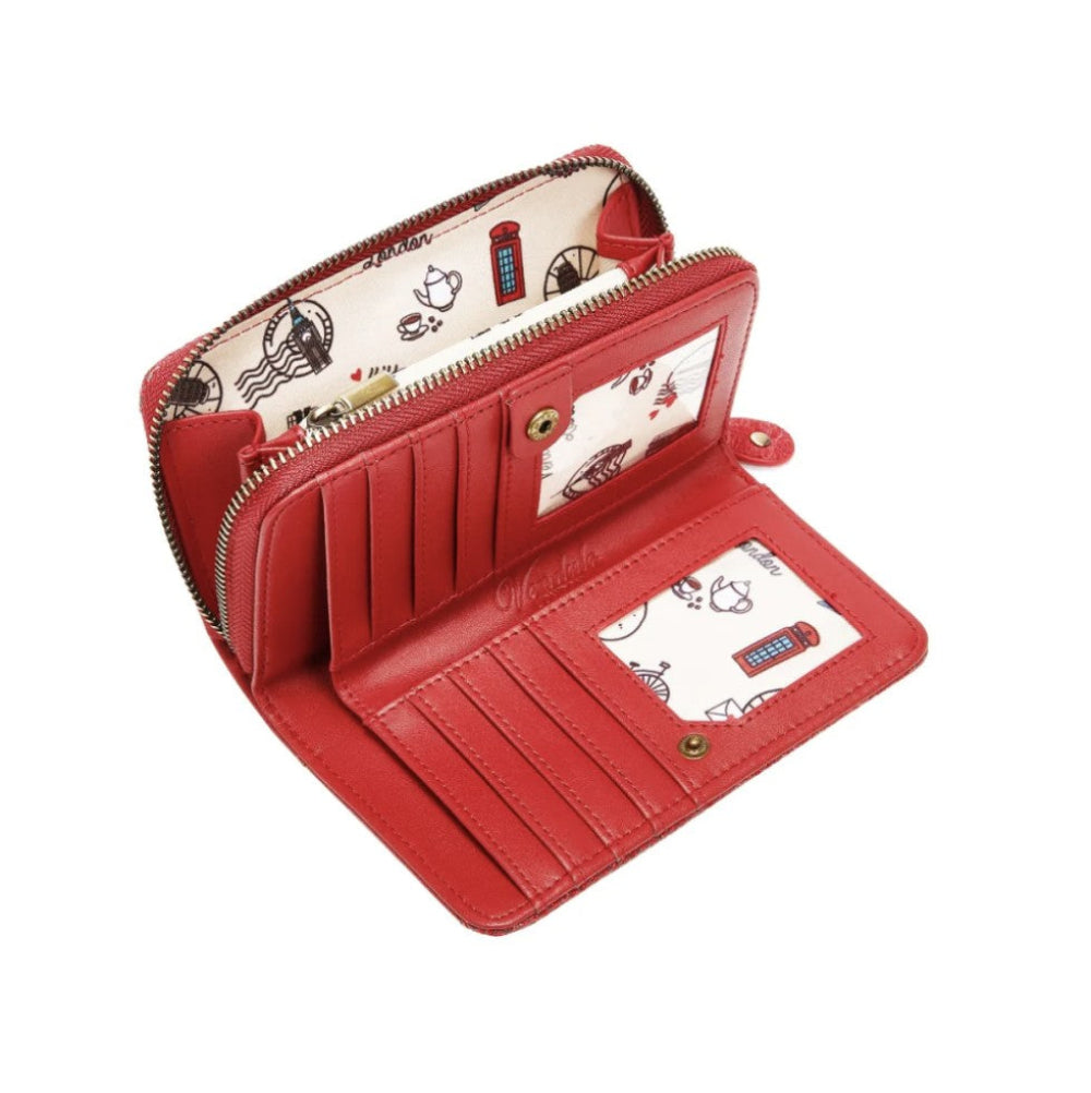 Red wallet with patterned interior on a white background
