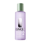 Clinique Clarifying Lotion Step 2 400ml in a translucent light purple bottle with a metallic sage green cap