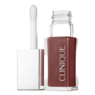 Clinique lip gloss with applicator on a light gray background