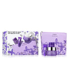 Clinique skincare set with purple packaging on a white background