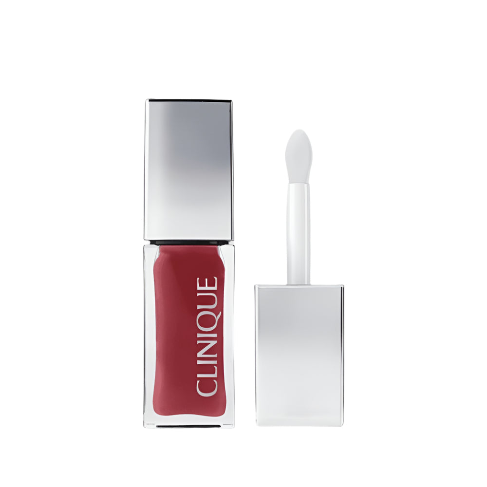 Clinique pink honey lip gloss with applicator on a white background