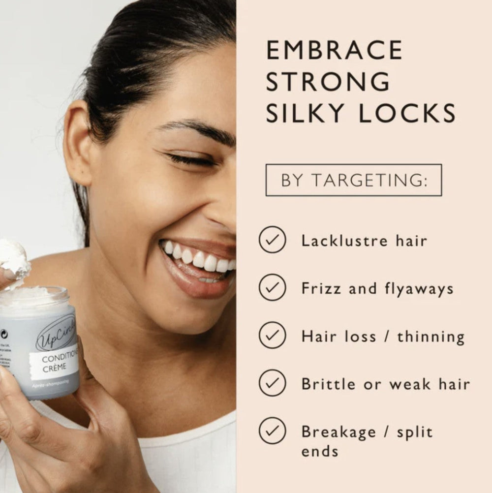 Woman holding a jar of hair care product with text about hair benefits on a beige background