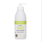 A white pump bottle of MooGoo Natural Sensitive Scalp Cream Conditioner