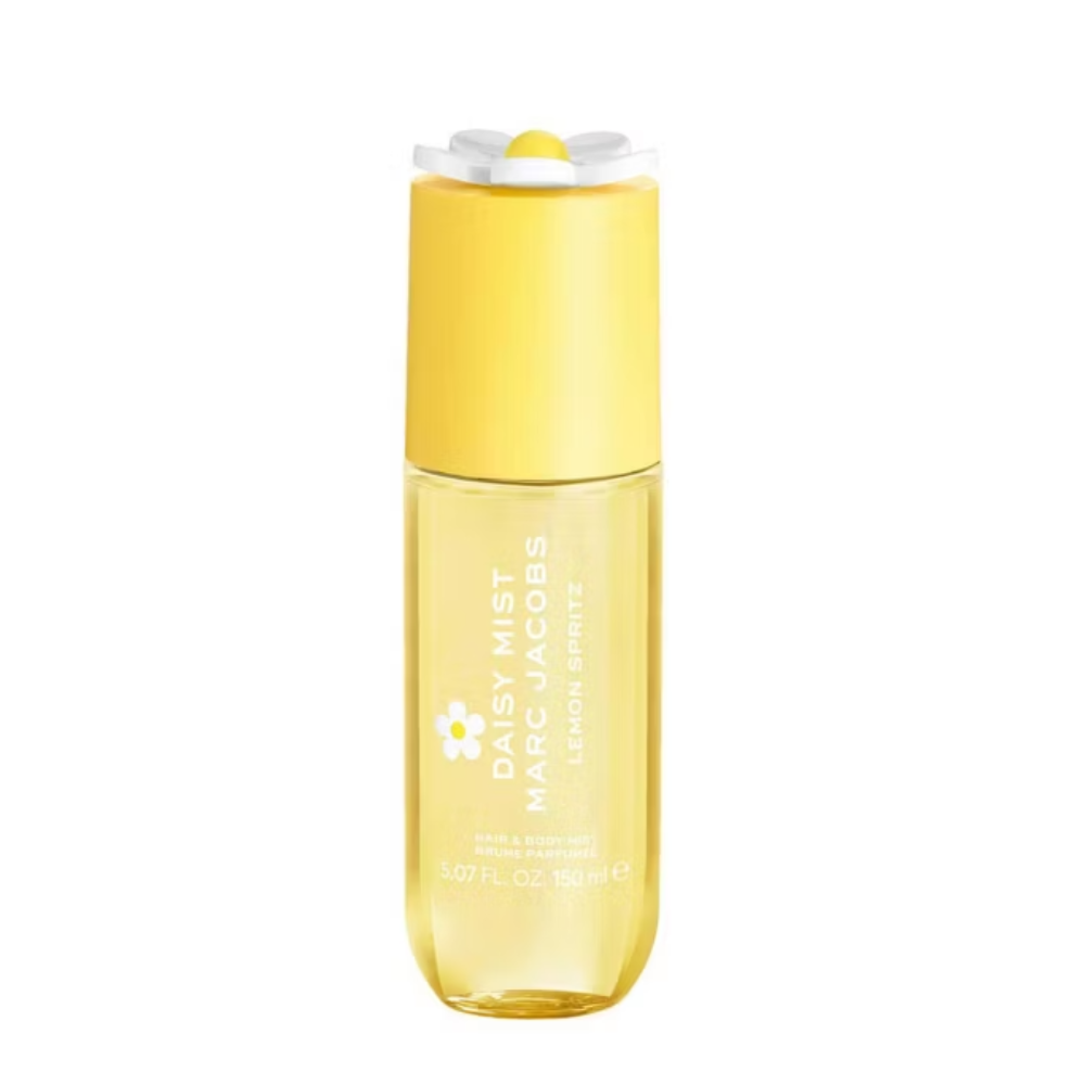 A bottle of Daisy Lemon Spritz Body Mist with a bright yellow cap and a clear body showing the yellow liquid inside, set against a plain white background.