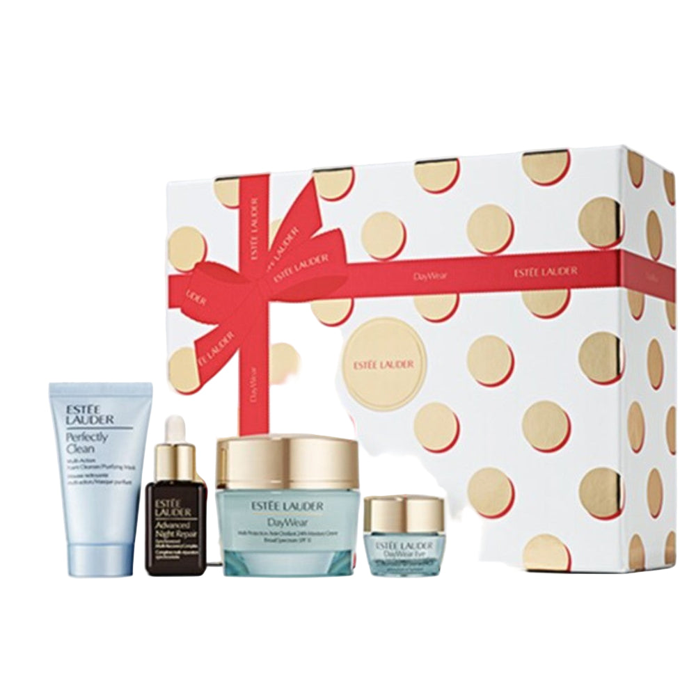 Estée Lauder skincare products with a polka dot box on a white background