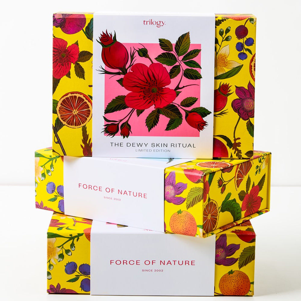 Set of skincare product boxes with floral and nature-themed designs on a white background