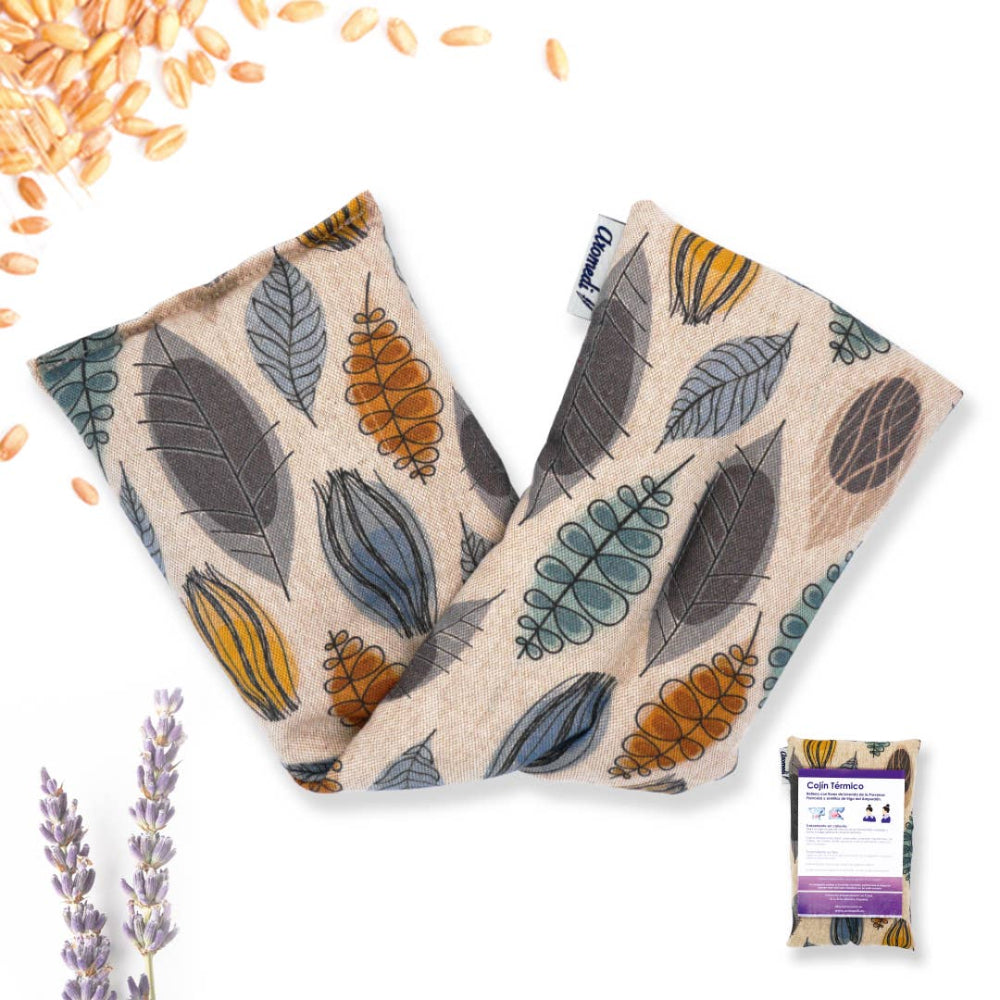 A pair of therapeutic pillows with a printed design featuring purple flowers and lavender, along with individual packaging shown in the foreground.