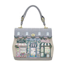 Handbag with a design of shop fronts on a white background