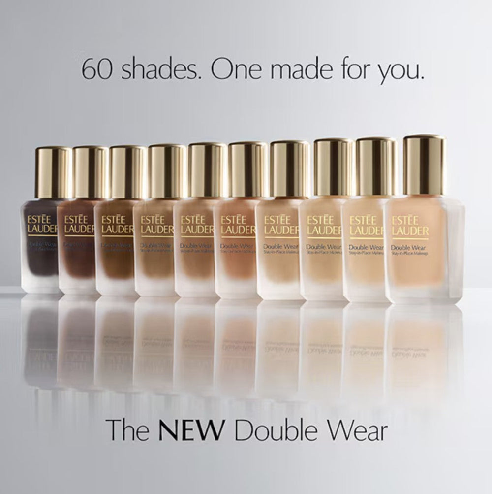 Estée Lauder Double Wear foundation bottles on a gray background with text '60 shades. One made for you.'